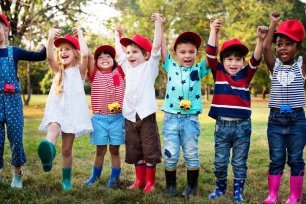 Children of all ages engaged in various program activities at Tiny Tots Christian Academy